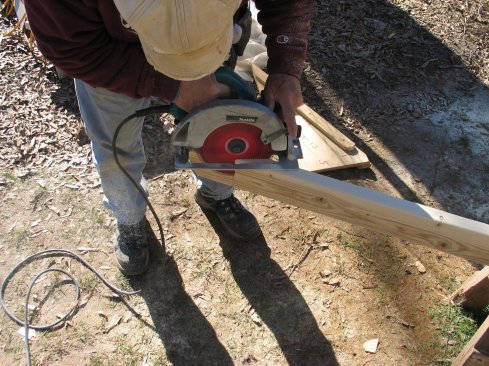 To cut the acute angle, make the cut from both sides of the plate stock. When finished cutting, smooth the cut surface wth a belt sander. Measure and cut the plate to length by making a simple plumb cut at the top.