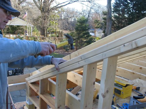 After putting in the studs for the dropped gable, cut and install the second plate.