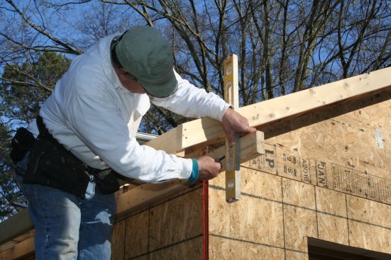 Before framing the return, plumb down from the barge rafter and mark where the end of the ledger will be cut.
