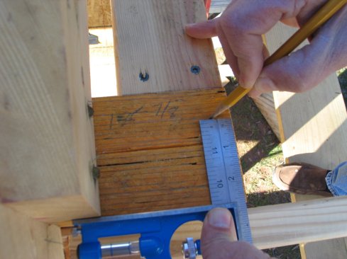 Measure and mark that distance in at the end of the wall. That mark is where the bottom long point of the gable plate will land.