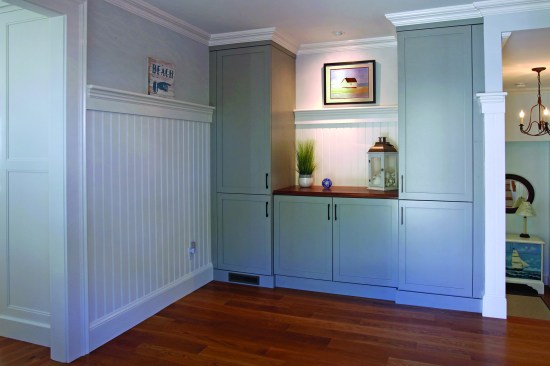 Tall paneling is not considered to be wainscot, but rather wall paneling with a plate rail on top.