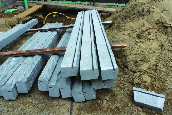 The prefabricated Pennsylvania bluestone cap comes ripped to 2 3/4 inches wide.