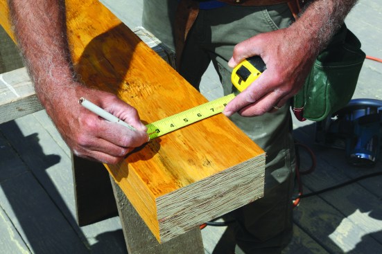 After cutting the LVLs to length, the author lays out the fastener pattern.