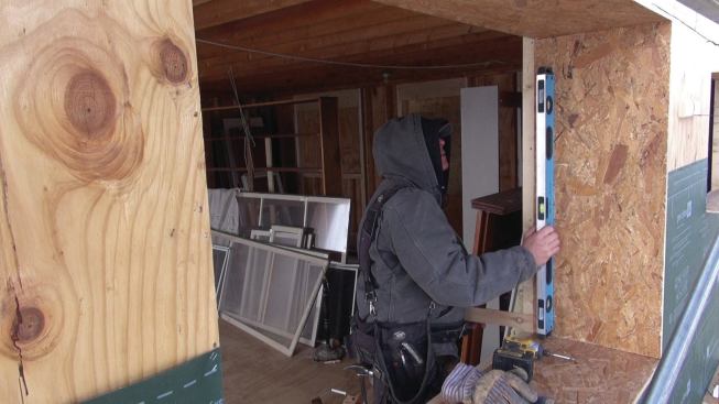 Each piece has to be carefully shimmed, plumbed, and leveled to make up for the irregular wall framing.
