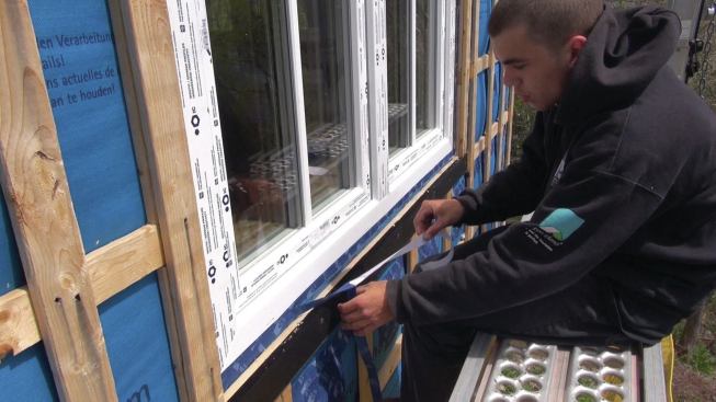 Finally, the Pro Clima Solitex Mento Plus drainage plane membrane is sealed to the window with Vana tape.