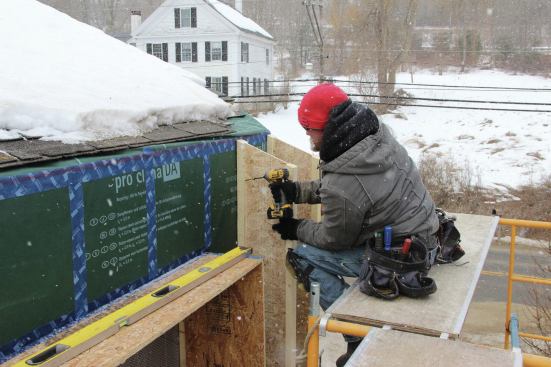 I-joists are screwed to the wall at the studs.