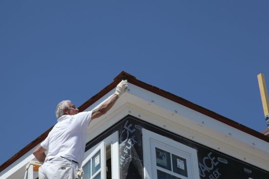 If trim is to be painted, automotive Bondo can be used to fill both screw and nail holes. It should be sanded flush after it cures.