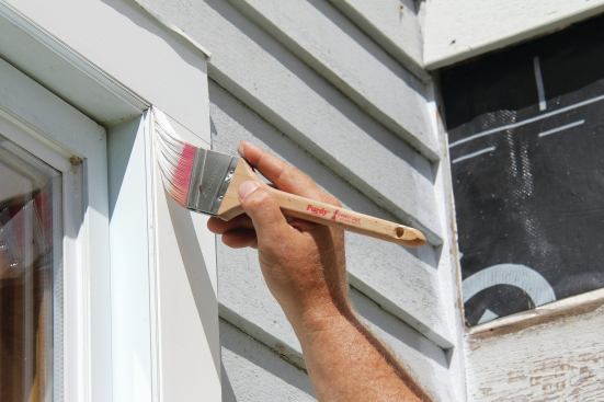 Once the trim is sanded, it can be painted with a high-quality self-priming 100% acrylic paint