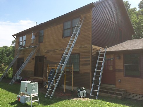 On hail-damaged clapboards, we found sanding down to raw wood eliminated 95% of the pitting. However, in a few spots the impact of the hail stones penetrated deeper, and we had to spend a little more time sanding out these deeper dings in the wood grain.