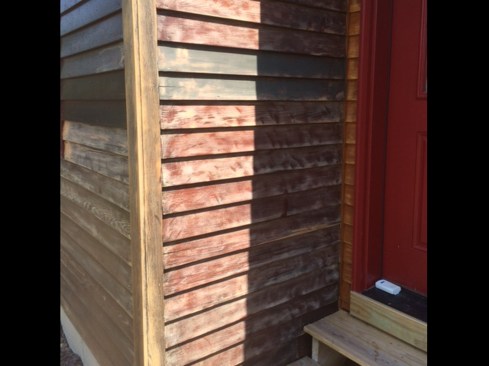 The pitting was random in its intensity and location. For instance, this small return wall adjacent to the front façade needed only to be scuff-sanded.