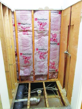 The joists in the smaller, 3x4 shower ran perpendicular to the linear drain.