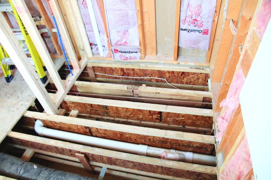The joists in the larger, 3x5 shower ran parallel to the linear drain.