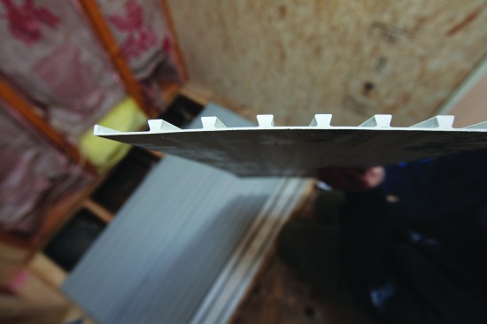 TI-ProBoards have interlocking edges that slide together. The strength of the panels comes from their ribbed profile, which interlocks with the mud base.