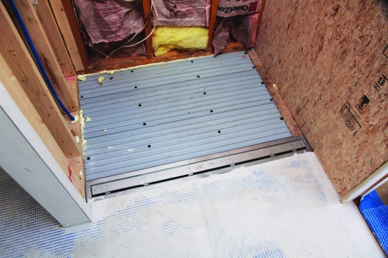 Permat added only about 1/8 inch to the thickness of the tile base.