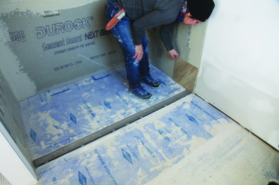 As the walls were installed, care was taken to make sure the drop-in tiled drain cap still had proper clearance.