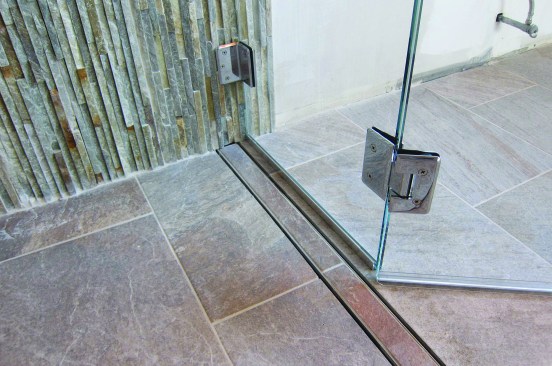 The glass doors were hung on two heavy-duty stainless steel double-acting hinges.