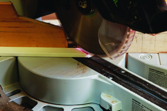 After I cut the first return cap, I swing the saw and cut the miter in the opposite direction.