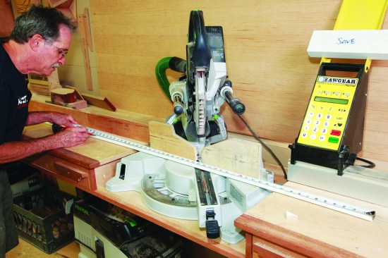 I hook a tape on the long point of the miter and measure to the opposite long point.