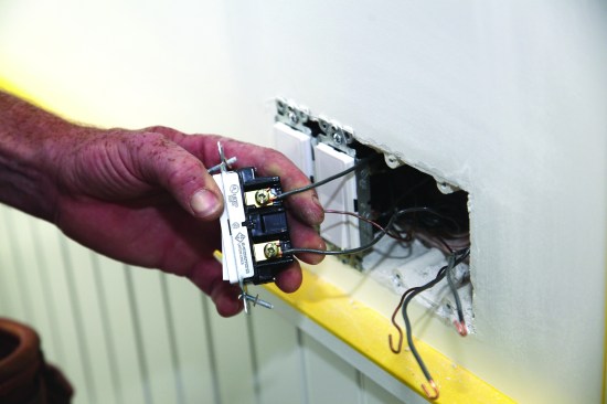 The load and supply conductors attach to screws on the other side.