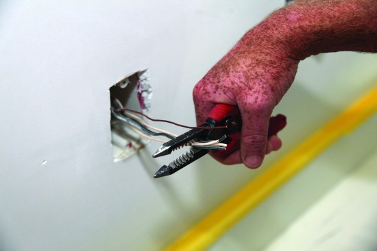 The author cuts the conductors, leaving the ground slightly longer.