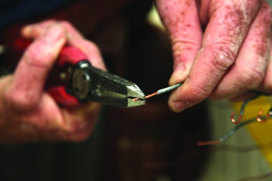 To form a loop, grab the end of a conductor with pliers ...
