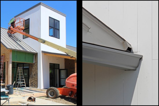 At the stair tower (photo, left), the siding was installed with a 1-inch gap between the roofing and bottom edge of siding; note the kick-out flashing formed into the roofing pan (photo right).