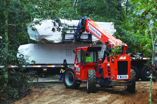 Rough terrain forklifts (or telehandlers) were designed to move material from off-loading zones closer to jobsites and to lift manageable loads to elevated work areas.