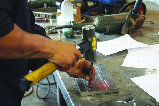 Then they are marked with a center punch.