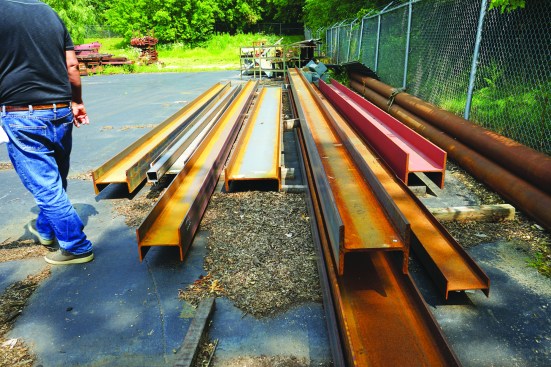 Engineers often specify steel I-beams to carry heavy loads or to span large distances in a home.