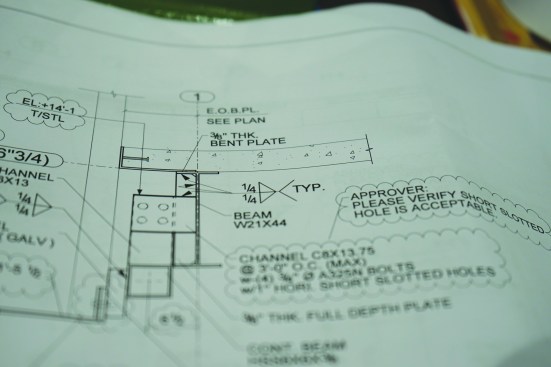 On plans, beams are labeled according to size and weight.