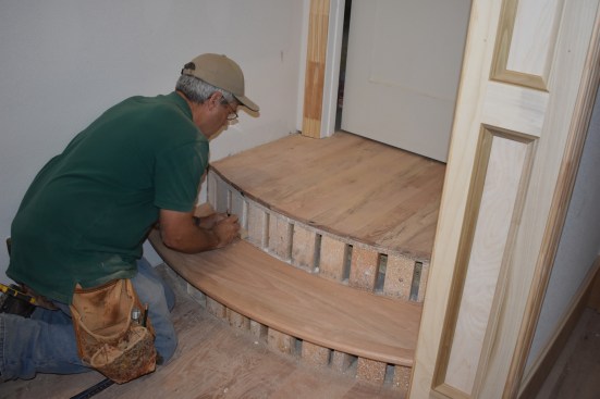The author uses a block to do a finer scribe of the inside curve.