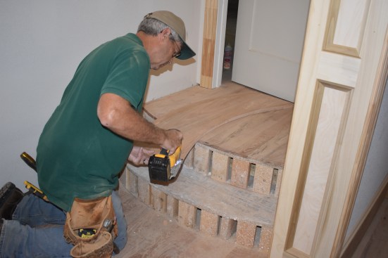The author cuts the final scribe with a jig saw.