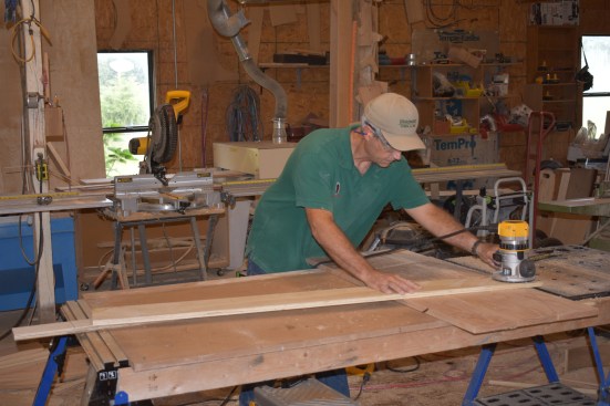 After attaching a router to a 1x6 trammel board set at the proper radius, the author cuts a groove along the arc using a dado bit inthe router. The router cut a groove only about 3/8-inch deep.