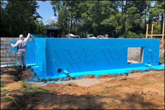 Figure 13. On this project, the CMU walls were sprayed with Poly Wall Home Stretch liquid waterproofing membrane…