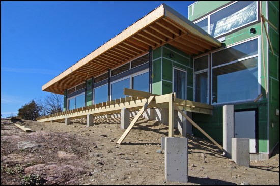 Figure 2b. The larger deck off the main living area (where the slab on grade was installed) was close to grade and supported by shorter piers.