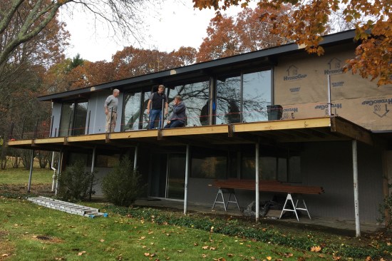 The deck and home well on its way to being restored to it’s original state—the sunroom and bump-up transition on the main roof removed.