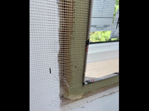 A temporary screed board made from ripped-down clear pine was run 1/4 inch proud of the jamb extensions. The screed’s edges were wrapped with plastic tape for easier release.