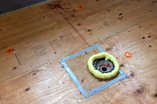 When pouring liquid-applied self-leveling compound, the author first sets screws to a level elevation using a laser, paints the screws fluorescent orange to stand out … 