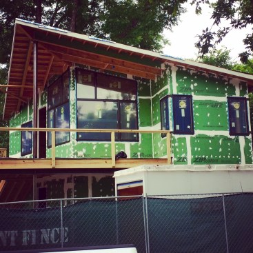 The author's first venture into using liquid-applied flashing on a new build: He liked ZipSystem sheathing, but was leery of the tape at first. 