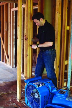 Many problems like open woodwork joints and drywall cracking can be attributed to framing moving as it dries and woodwork absorbing moisture during construction. To prevent these problems, Matt Risinger checks the moisture content of wood framing, not closing it up until it’s near 12% MC, and using fans to get it there.