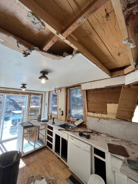 A view of the existing kitchen interior at the beginning of the demolition phase.