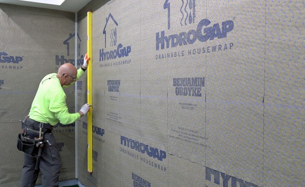 TruExterior needs to be fastened to studs, so the author marks them out beforehand.