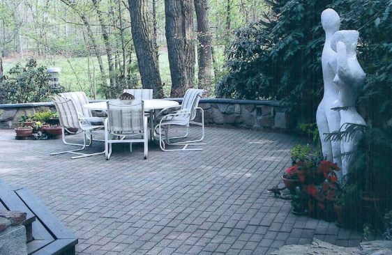 Before. The concrete pavers on the existing patio ...