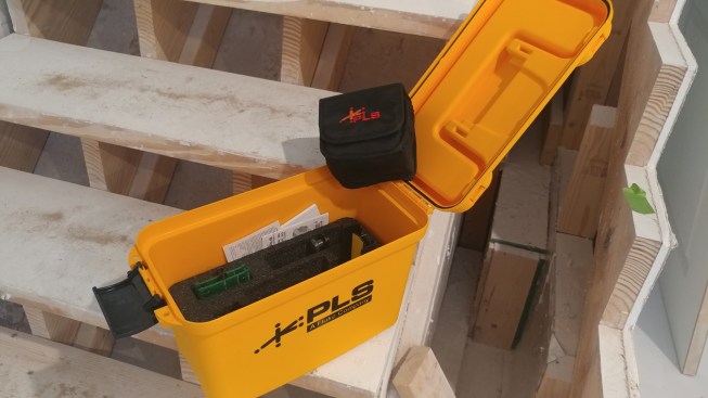 The plastic ammo can style box is excellent. It really protects the unit and smartly stores all the included accessories. Within the case, the laser also stores in a bag that you can also attach to your belt.