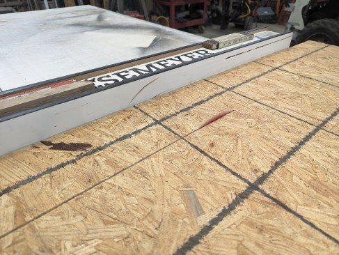 The author starts by ripping a sheet of 7/16-inch OSB into 5 1/2-inch widths.