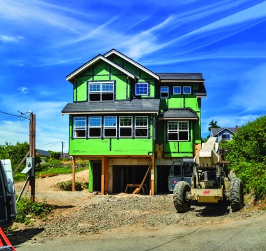 In order to support the lower level’s full-height concrete walls (which were designed to support the two-story walls above the two-car garage), all the footings had to be considerably wider and deeper than usual.
