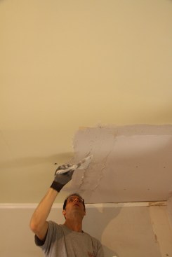 Next, I prefill any open joints and the perimeter of the patch with base-coat plaster.