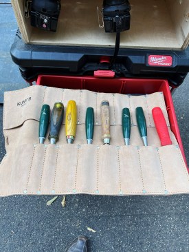 Tool rolls, such as the author’s chisel roll, are useful for grouping and carrying a set of tools, and they store efficiently in the drawers of a tool storage system.