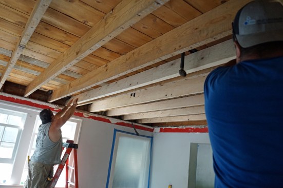 Ernesto and Toby Bonilla roll in sister joists .