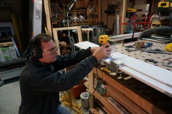 Once the layout is done, setting up the jig and routing a hinge mortise takes less than a minute.